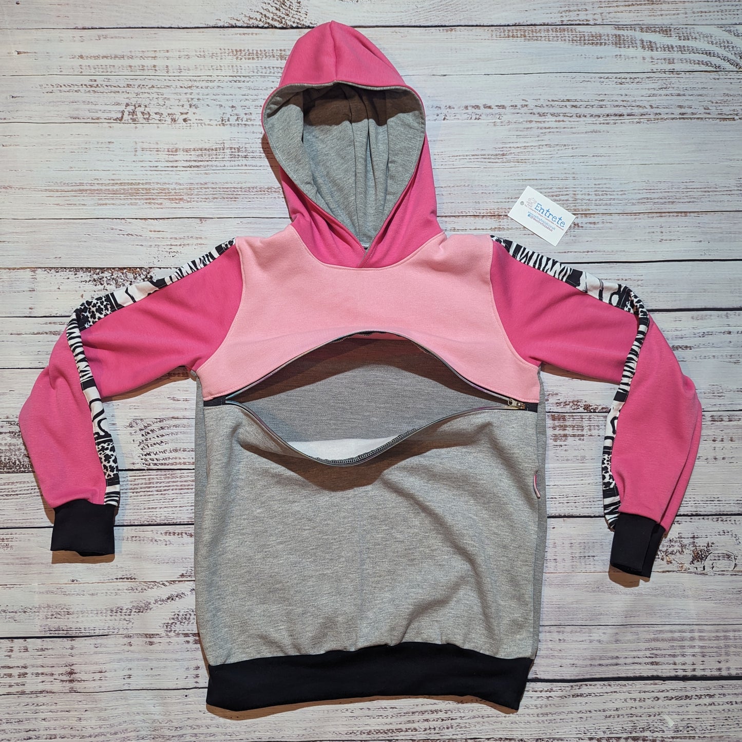 Animal hearts nursing hoodie. Handmade using pink, grey and animal hearts cotton French terry and cotton ribbing. Shown with the zipped front for easier nursing open.