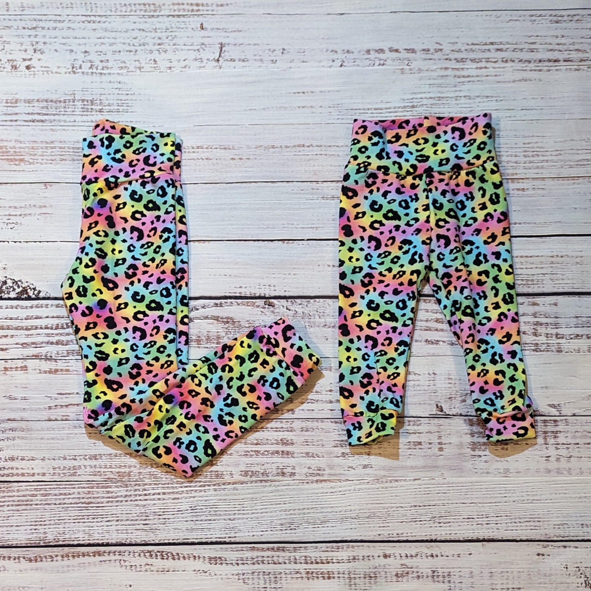 The gorgeous Mama and Mini rainbow leopard print leggings. Lovingly handmade using soft and stretchy cotton jersey. Shown folded.