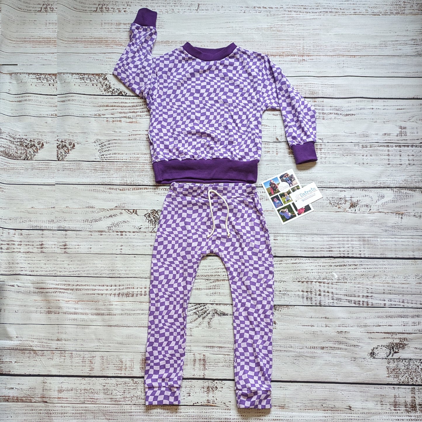 The fab purple trippy checked harem joggers. Shown with a purple trippy checked sweatshirt.