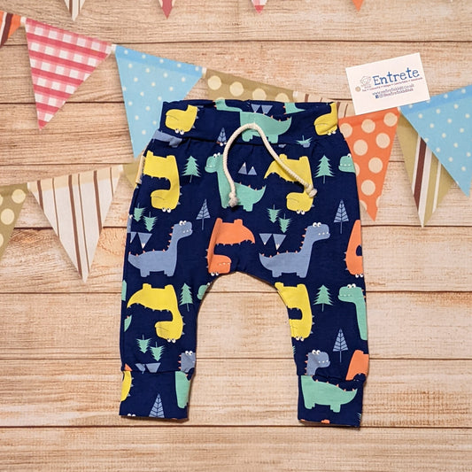 Prehistoric fun with the blue dinosaurs harem joggers. Handmade using blue dinosaur cotton jersey.