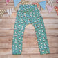 Adorable and ethical, organic mint penguins harem joggers. Handmade using mint penguins organic cotton jersey.  Shown from the rear.