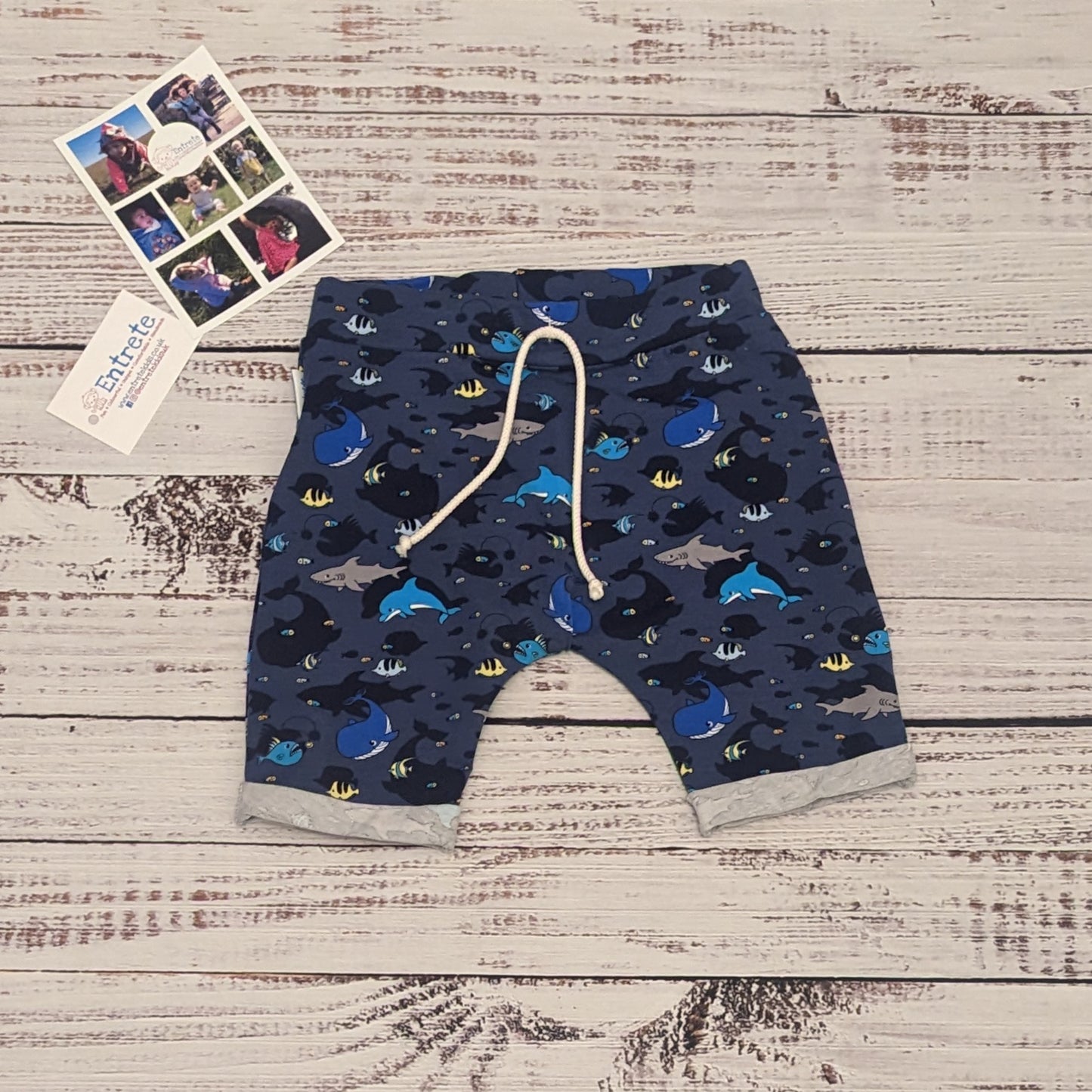 Kids sea creatures harem shorts. Handmade using navy sea life shadows cotton jersey.