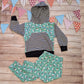 The adorable organic mint penguins harem joggers shown as an outfit with a matching hoodie.