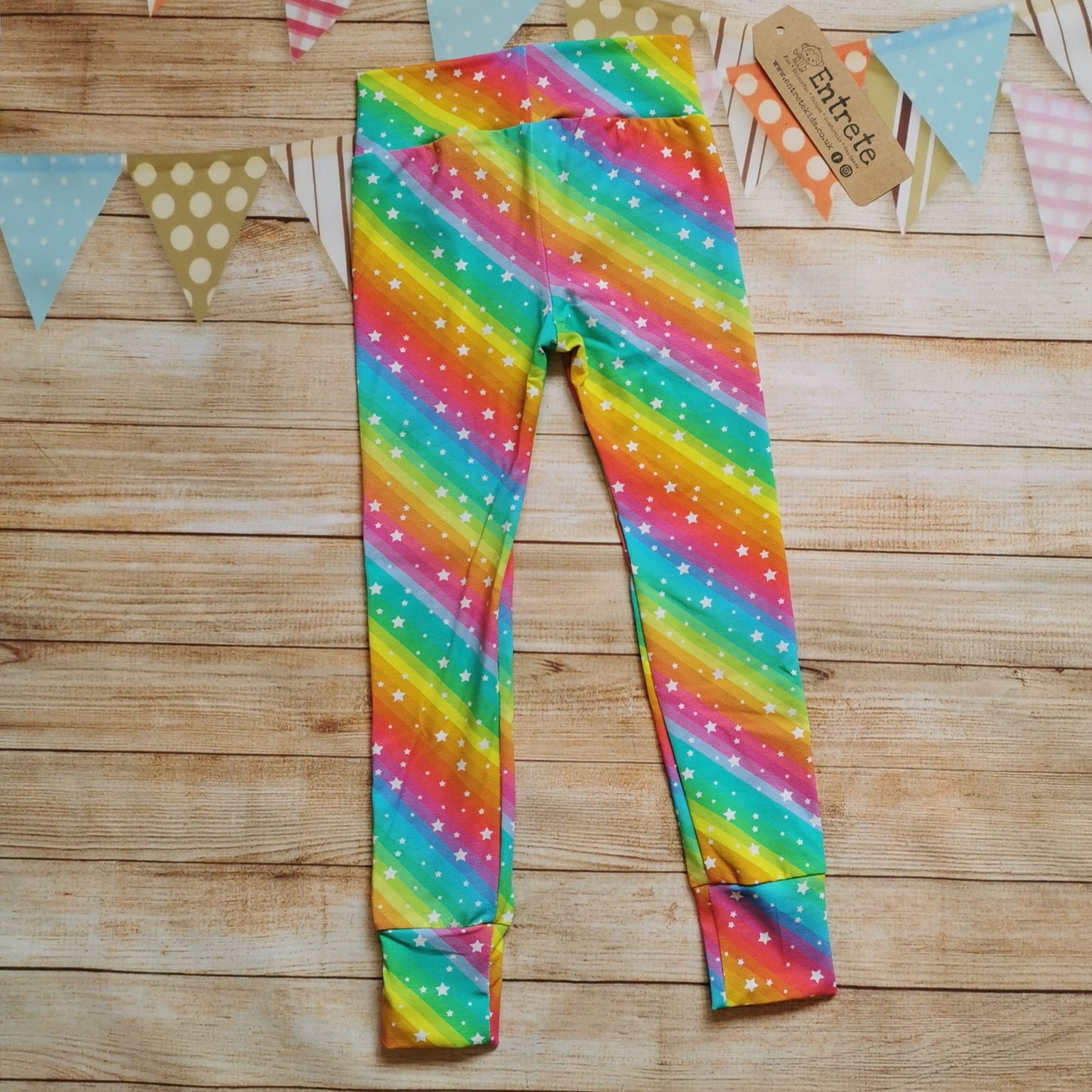 Rear of colourful and fun bright rainbow star leggings.