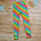 Rear of colourful and fun bright rainbow star leggings.