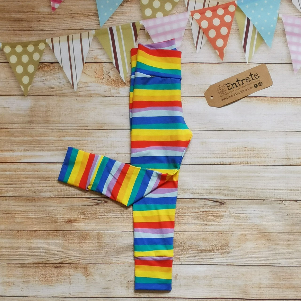 Folded soft and stretchy leggings with a comfortable non-elasticated waist. Handmade using red rainbow stripes cotton jersey, a colourful variation of the classic rainbow stripe.