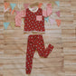 The fun Christmas penguins top shown as a set with matching red penguins leggings. (sold separately)