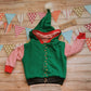 Fantastically fun reversible elf hoodie. Handmade in green cotton sweatshirt fleece, with red striped cotton jersey arms, graphite ribbing waist and red ribbing cuffs . With adorable pom-pom hood.