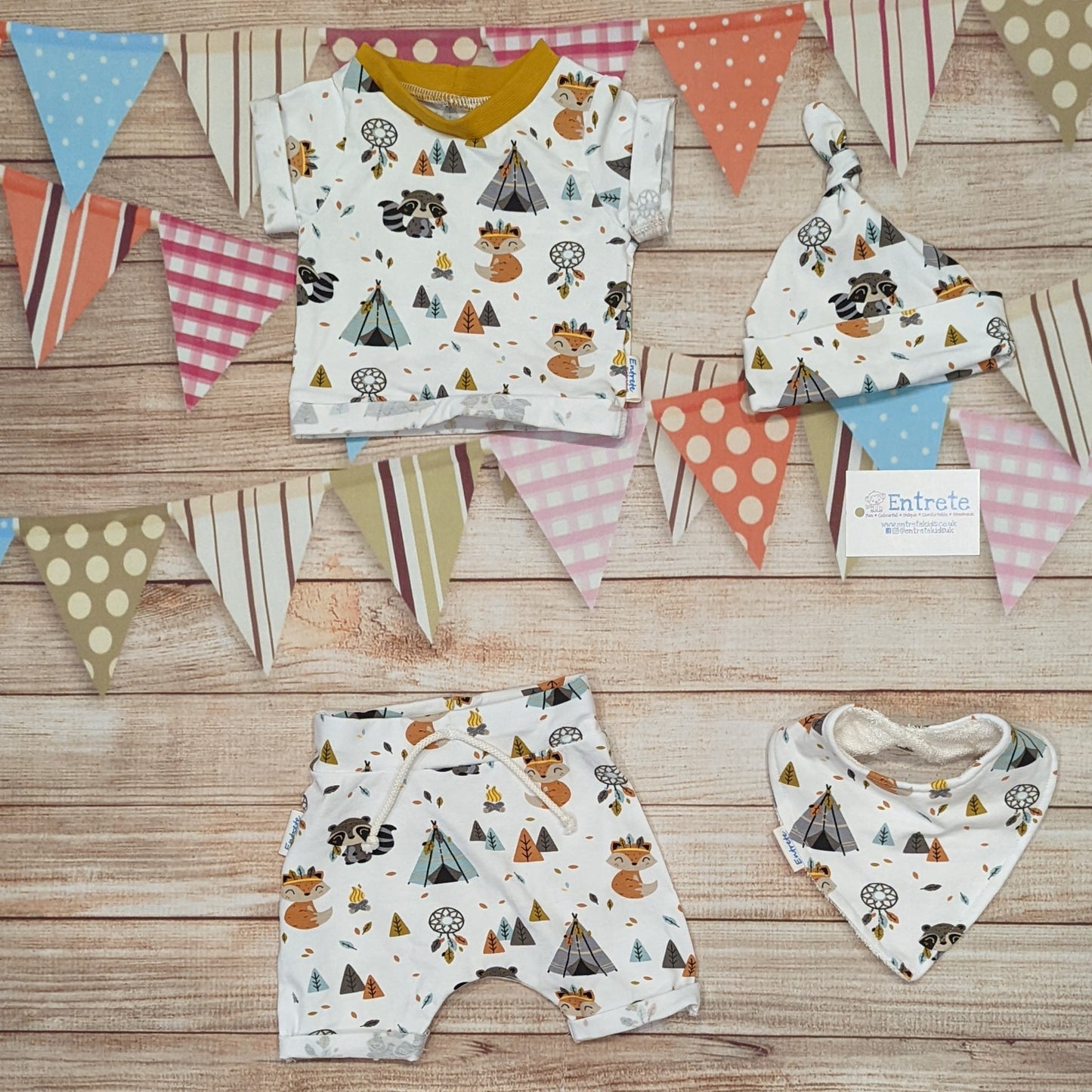 Cute and fun foxes and raccoons shorts, handmade using native American animals cotton jersey. Shown with a matching short sleeve tee, bamboo bib and tie top hat.