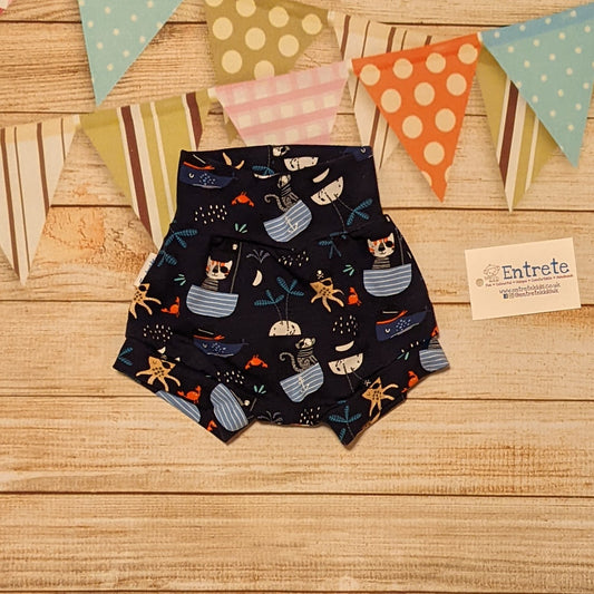 Fun and adventure awaits with these adorable pirate cats shorts. Handmade using pirate cats cotton jersey.