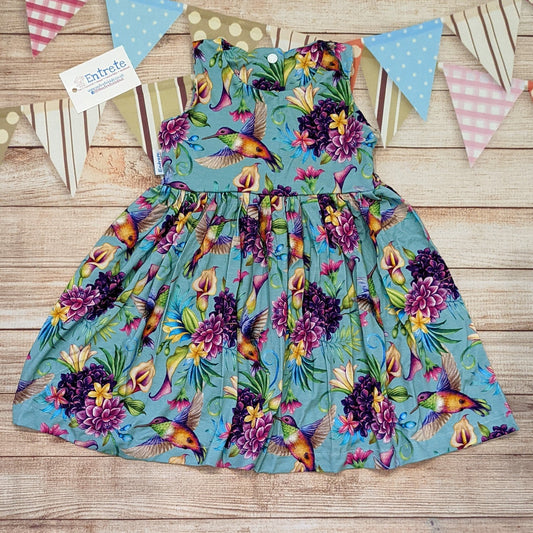 Beautiful green hummingbirds girls dress, handmade using green hummingbirds viscose jersey. Sleeveless version shown.