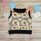 The gorgeous sunflowers sleeveless popper sweatshirt. Handmade using sunflowers cotton French terry, black cotton jersey and black cotton ribbing.