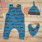 The epic blue surf campervan sleeveless romper. Handmade using blue surf campervan cotton jersey. Shown with a matching tie top hat and bamboo bib.