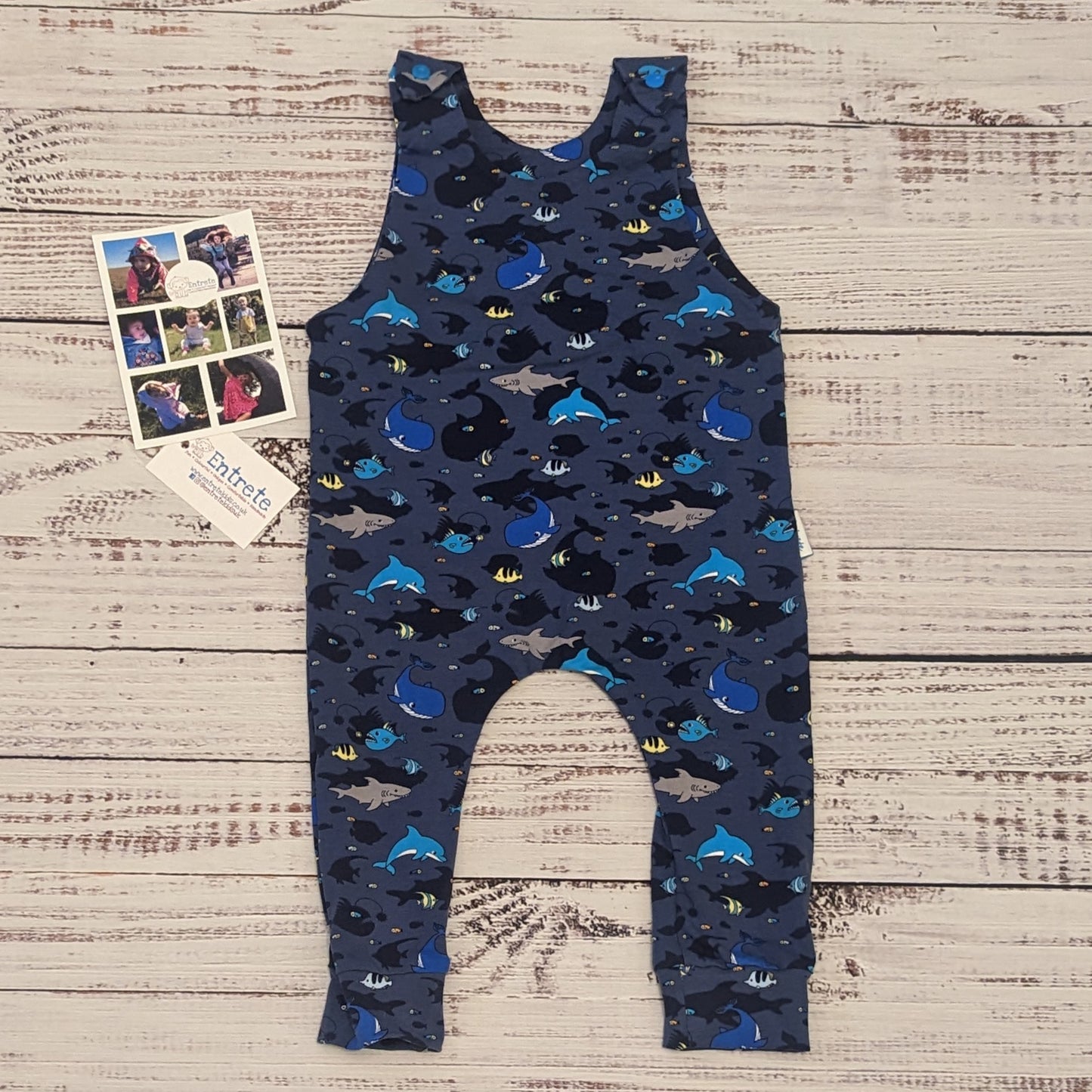 Kids sea life sleeveless romper, packed full of fun marine life. Handmade using navy sea life shadows cotton jersey.