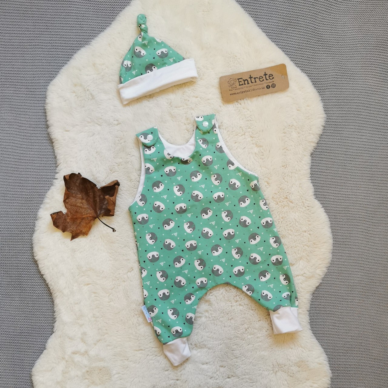 Romper gift set, shown in mint penguins cotton jersey for demonstration purposes only. Yours will be handmade using teal mini hearts cotton jersey.