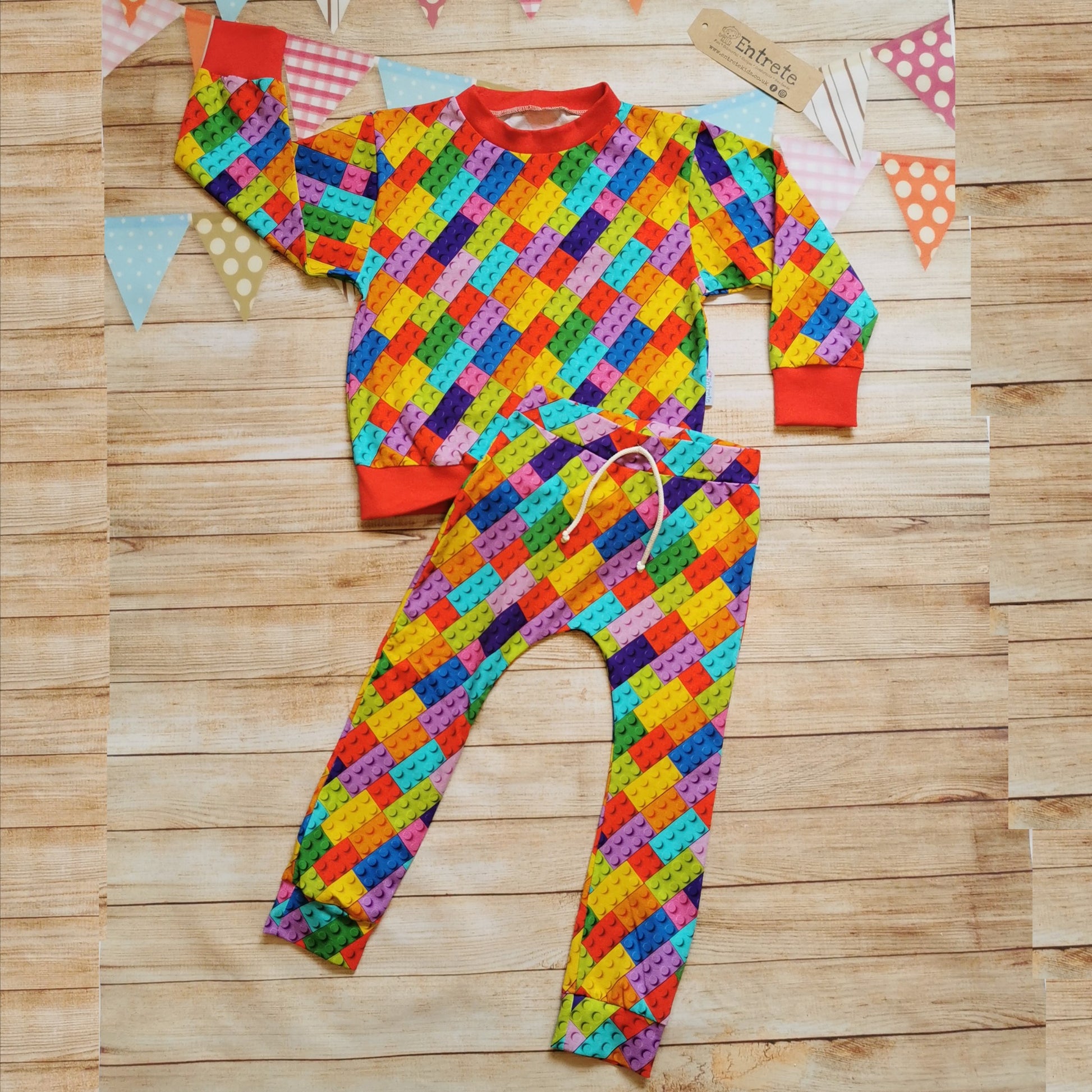 Colourful building blocks harem joggers, shown as an outfit with matching sweatshirt (sold separately).