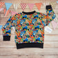 The awesome superhero sweatshirt. Handmade using colourful superhero cotton jersey and black cotton ribbing.