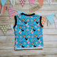 Rear of turquoise cartoon bombs child & Babies vest.