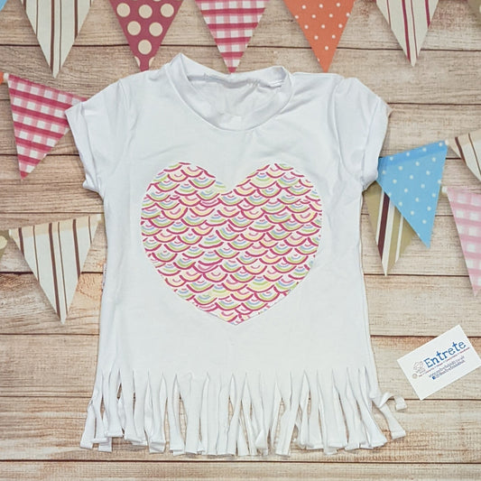 The feminine and beautiful mini rainbows heart tassel tee. Handmade using white and mini rainbows on white cotton jersey's, with white cotton ribbing.