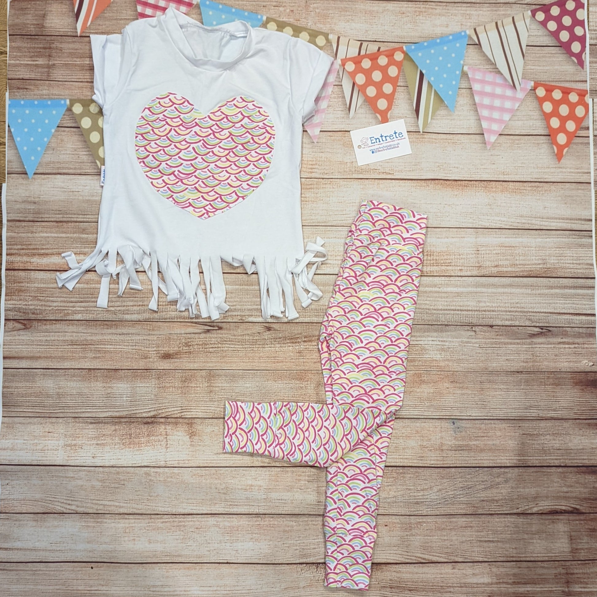 The adorable mini rainbows leggings, shown as an outfit with a mini rainbows heart tassel tee (sold separately).