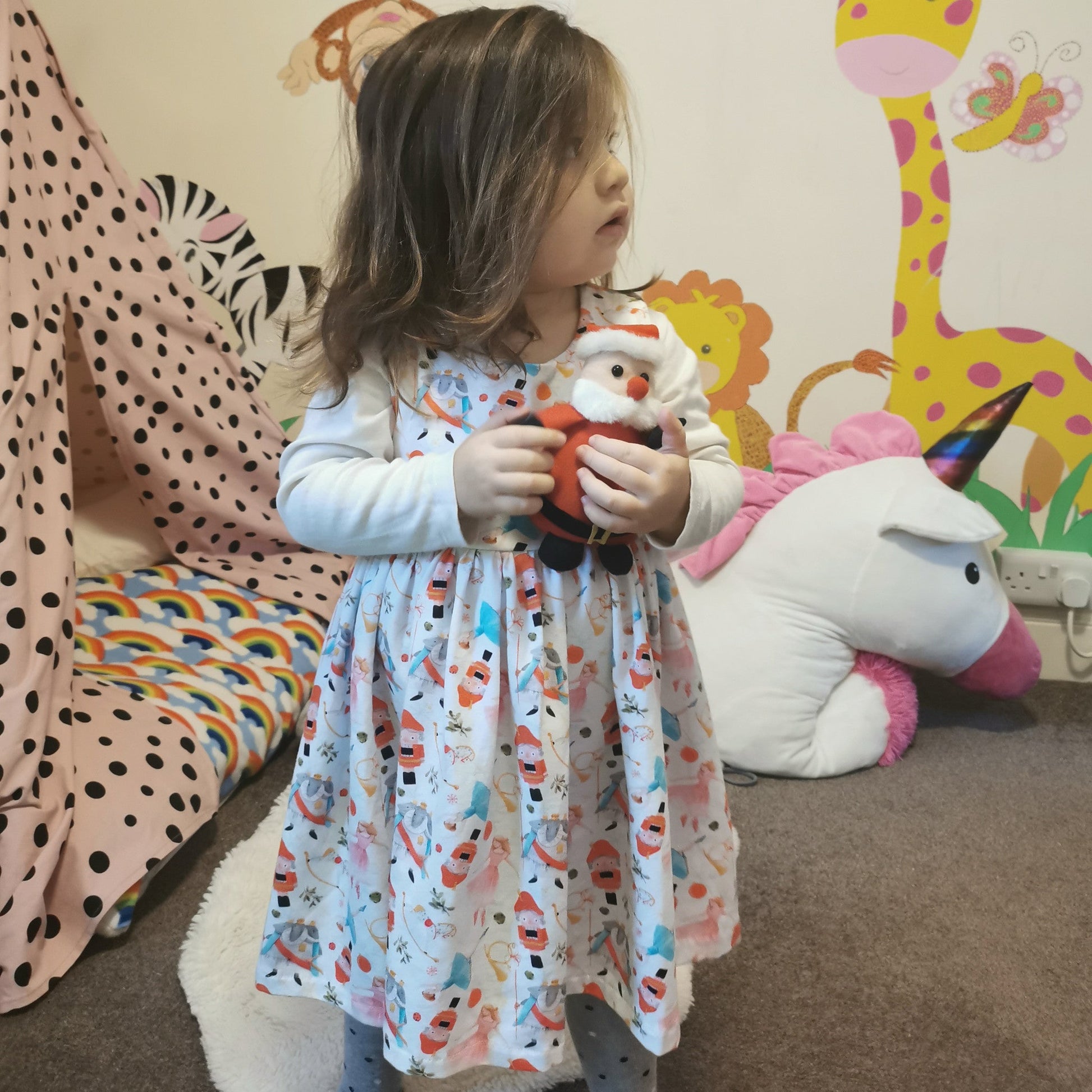 Sophie modelling her white nutcracker dress. Perfect for Christmas!